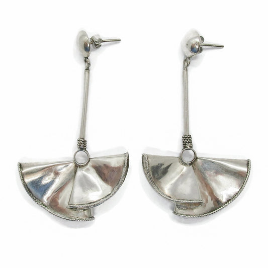 Front view of a pair of large sterling silver fan-shaped earrings for pierced ears