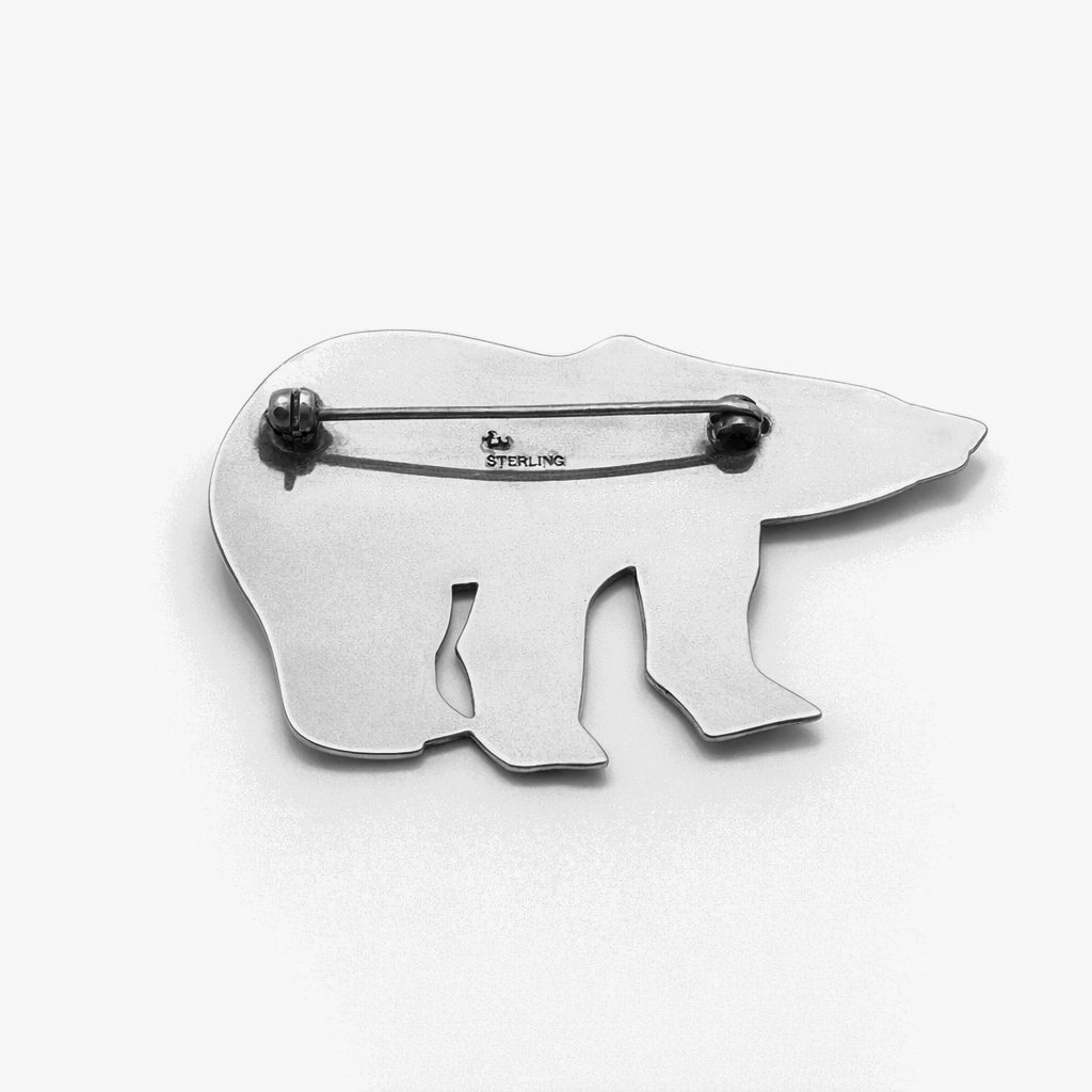 Back view of a sterling silver polar bear brooch showing hallmarks