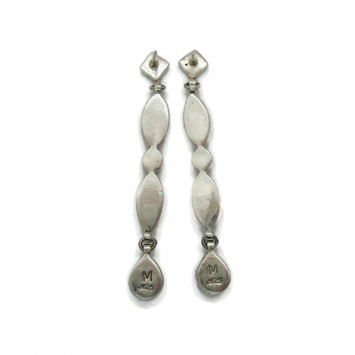 Back view of a pair of sterling silver and semi precious gemstone dangle earrings showing hallmarks