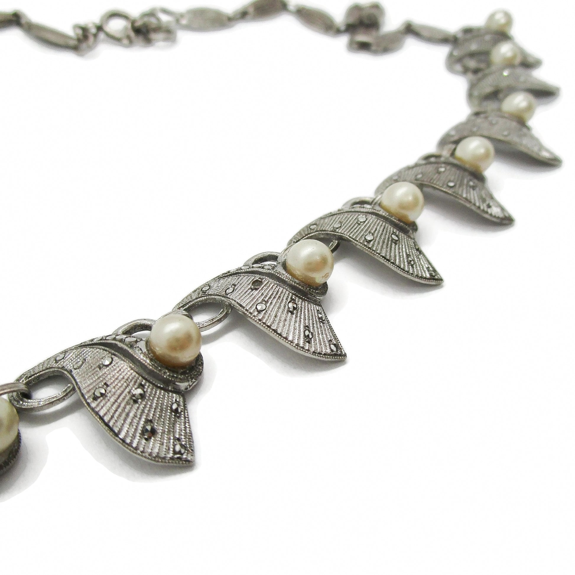 A Theodor Fahrner Germany sterling silver, marcasite and pearl necklace shown in close up