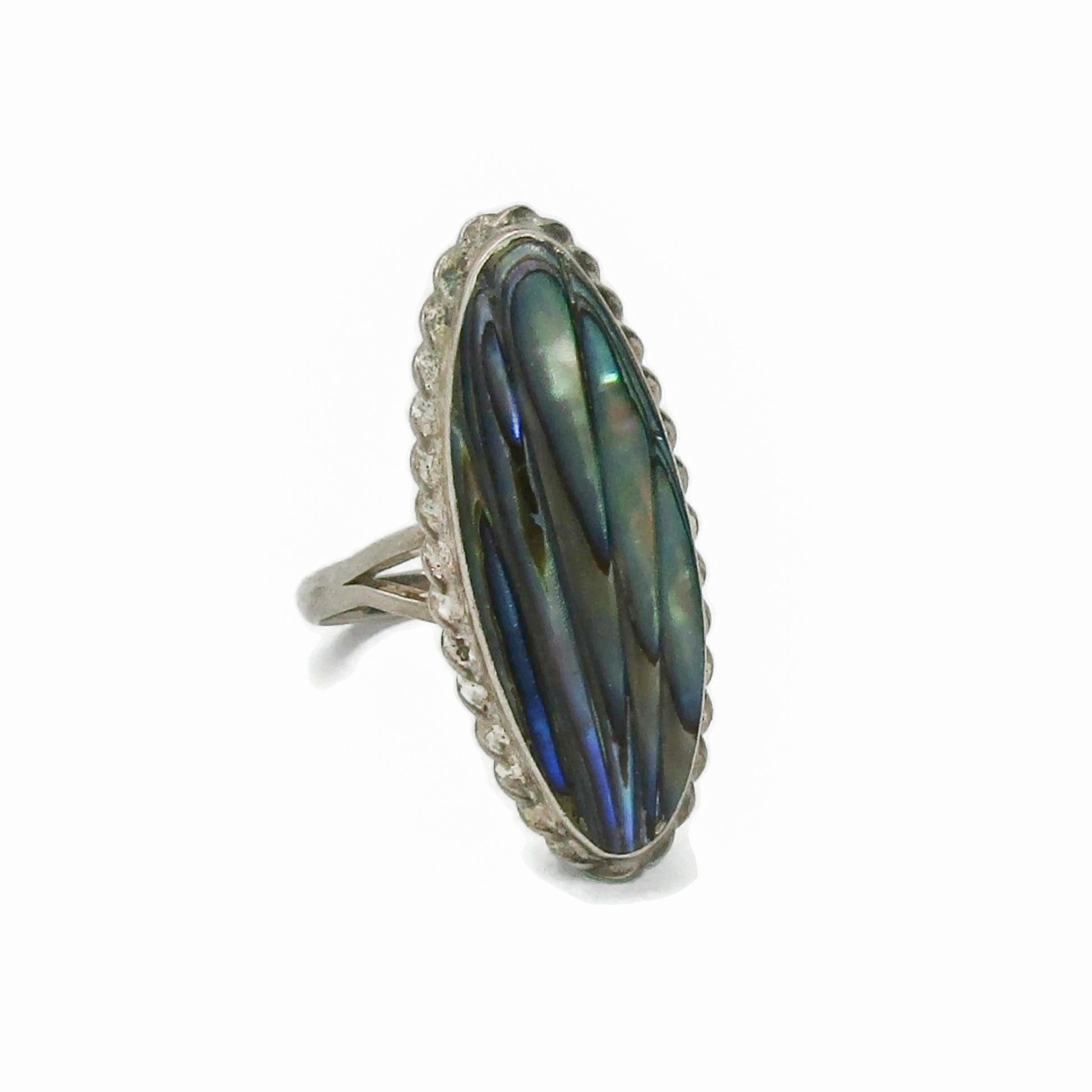 Side view of an oval sterling silver and paua shell ring by Ataahua New Zealand