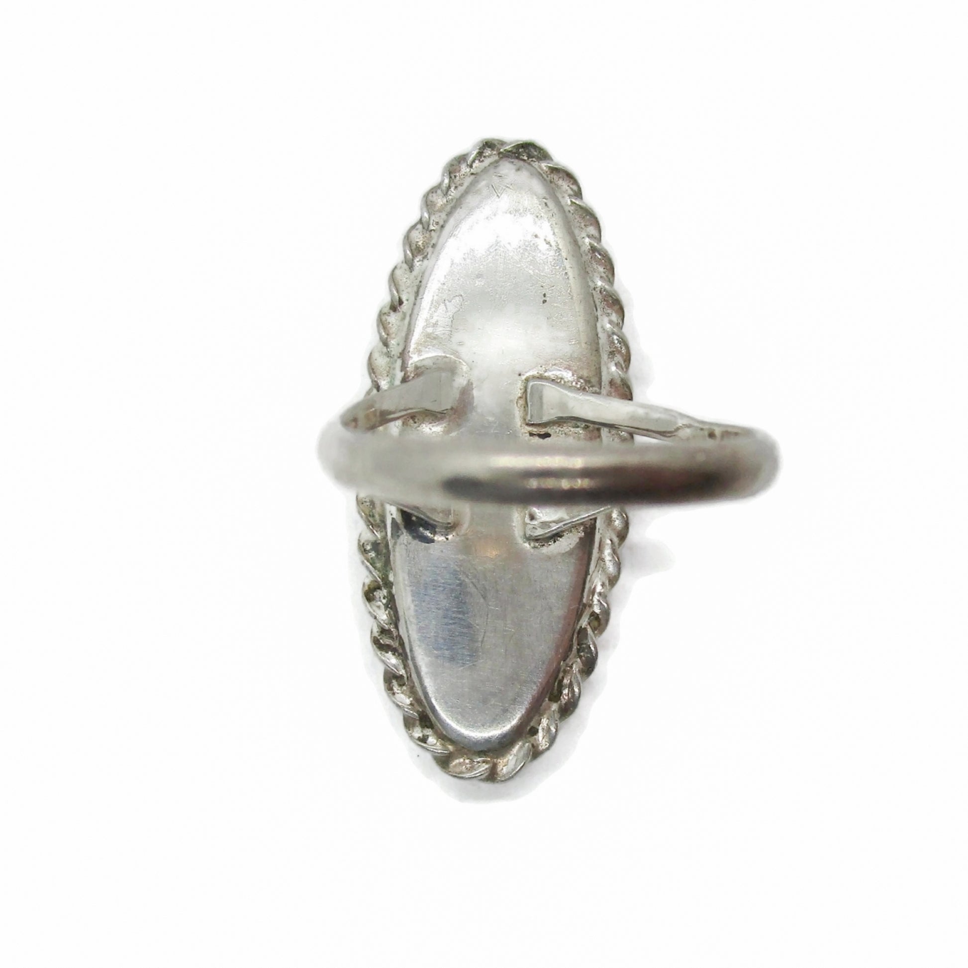 Back view of an oval sterling silver and paua shell ring by Ataahua New Zealand