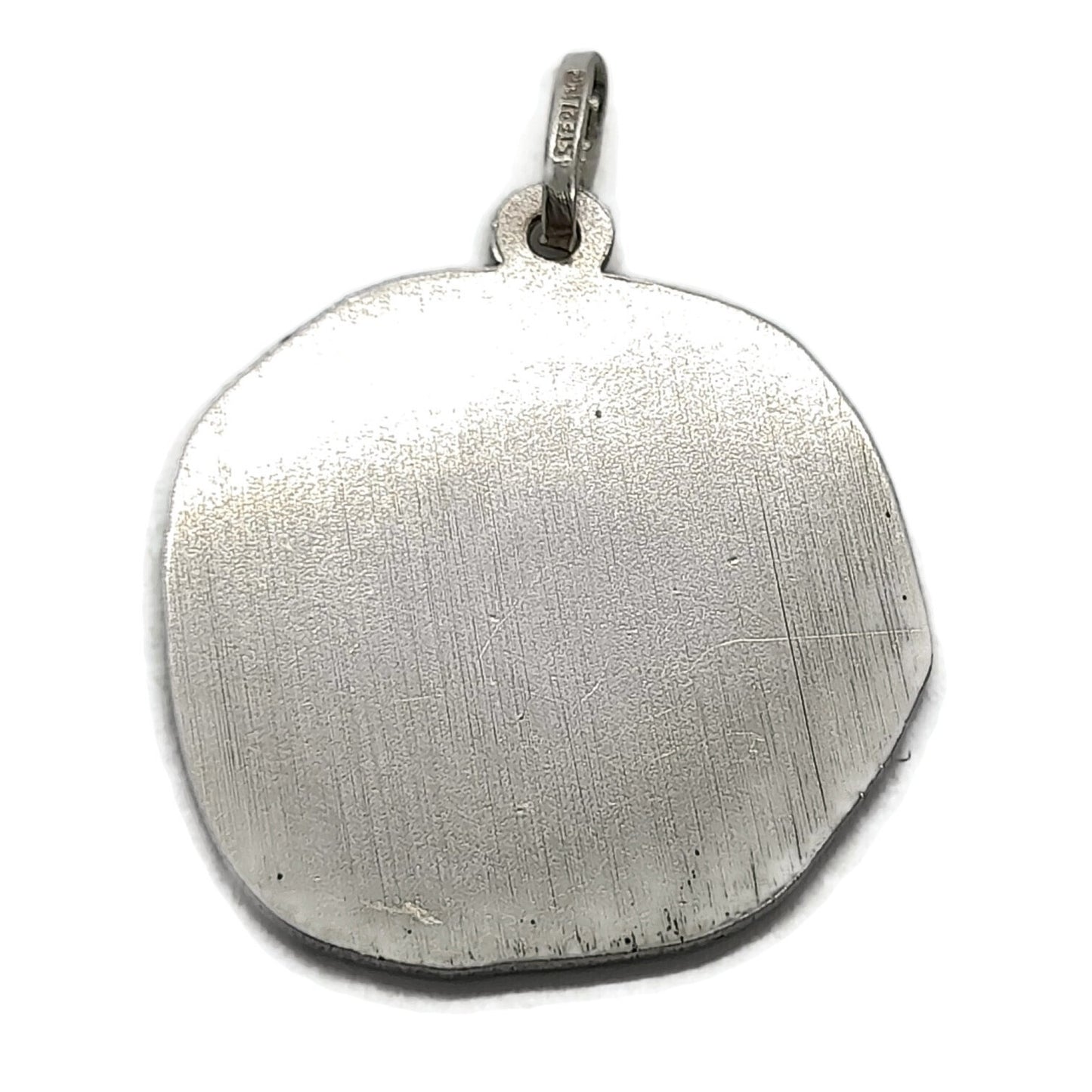 Back view of a vintage sterling silver Aquarius pendant