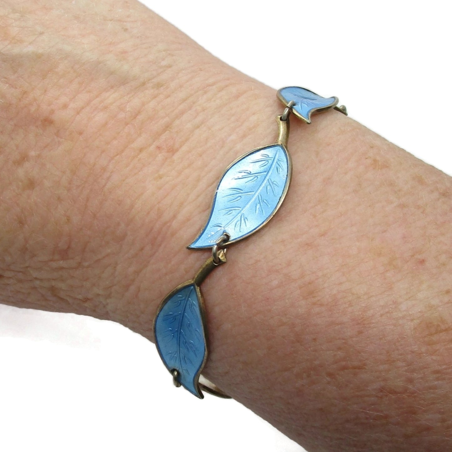 david andersen blue enamel sterling silver leaf bracelet worn on wrist