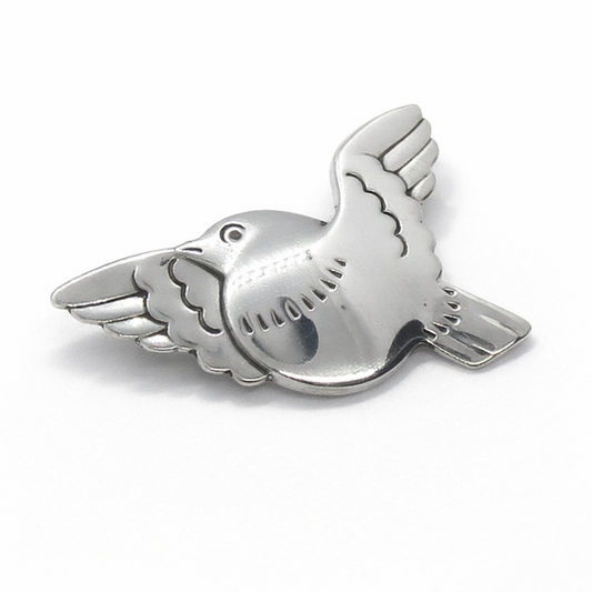 Angled view of Georg Jensen Denmark sterling silver bird brooch number 320
