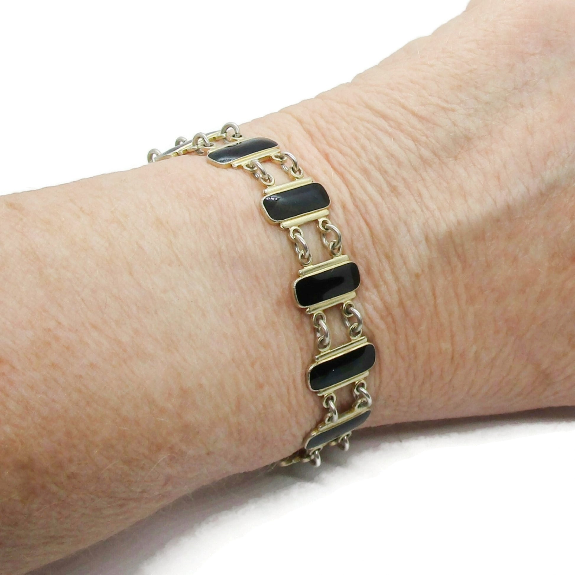vintage volmer bahner sterling silver black enamel link bracelet worn on wrist